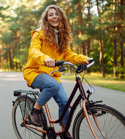 Young woman riding a bike